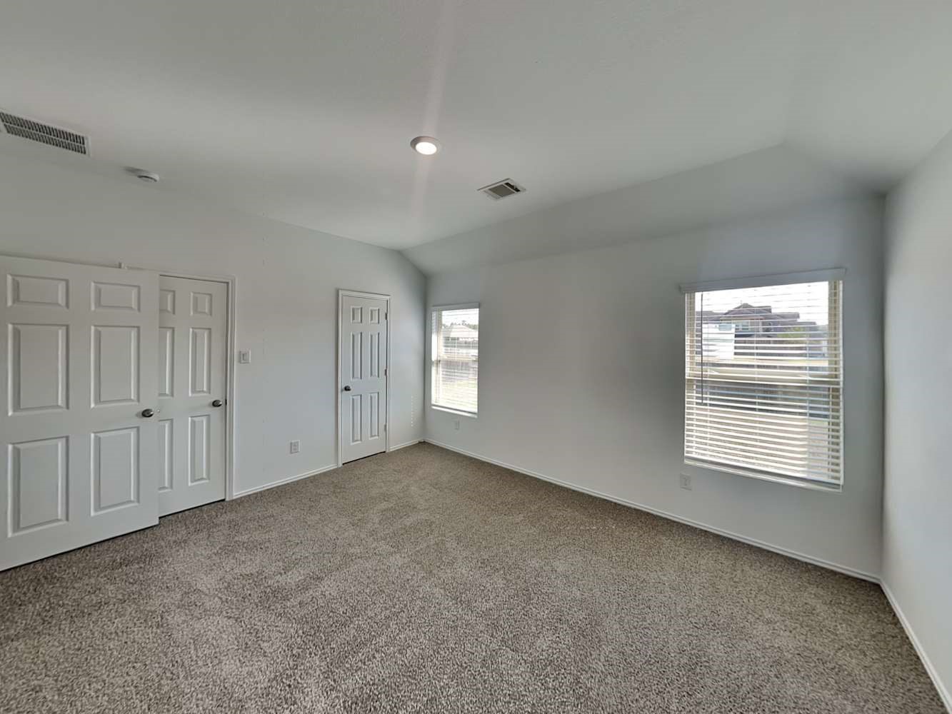 5936 Rimini Landing Lane Porter, TX 77365 - Photo 6 of 15 a view of an empty room with a window