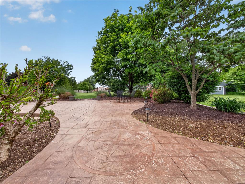853 Lahr Road Nazareth, PA 18064 - Photo 26 of 29 An inviting stamped concrete patio, adorned with a compass rose, sets the scene for outdoor enjoyment.