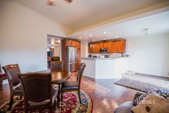 1609 South McCall Street Ridgecrest, CA 93555 - Photo 12 of 33 a view of a dining room with furniture and a kitchen