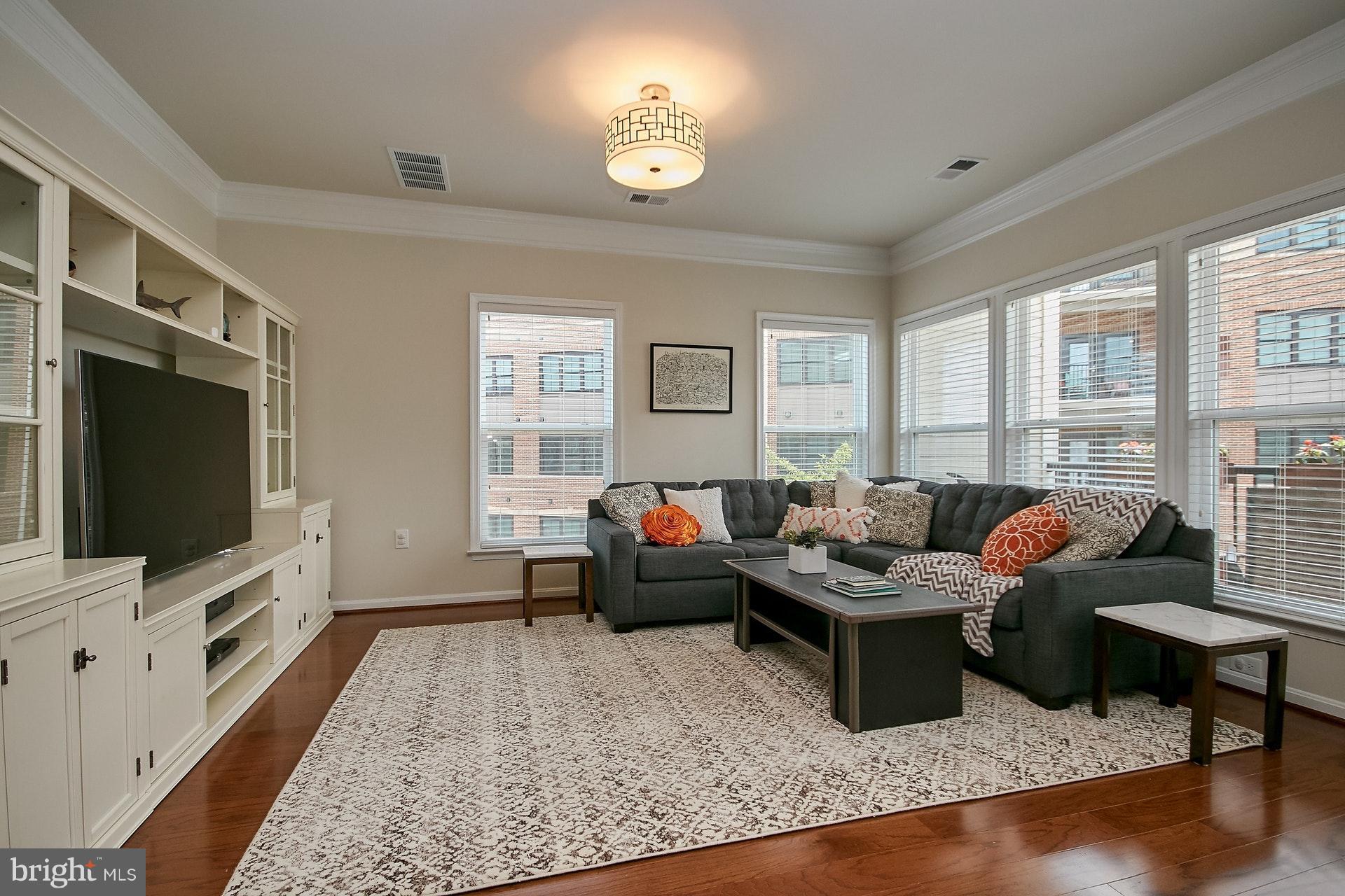 3073 Rittenhouse Circle, Unit 60 Fairfax, VA 22031 - Photo 14 of 30 a living room with furniture and a flat screen tv
