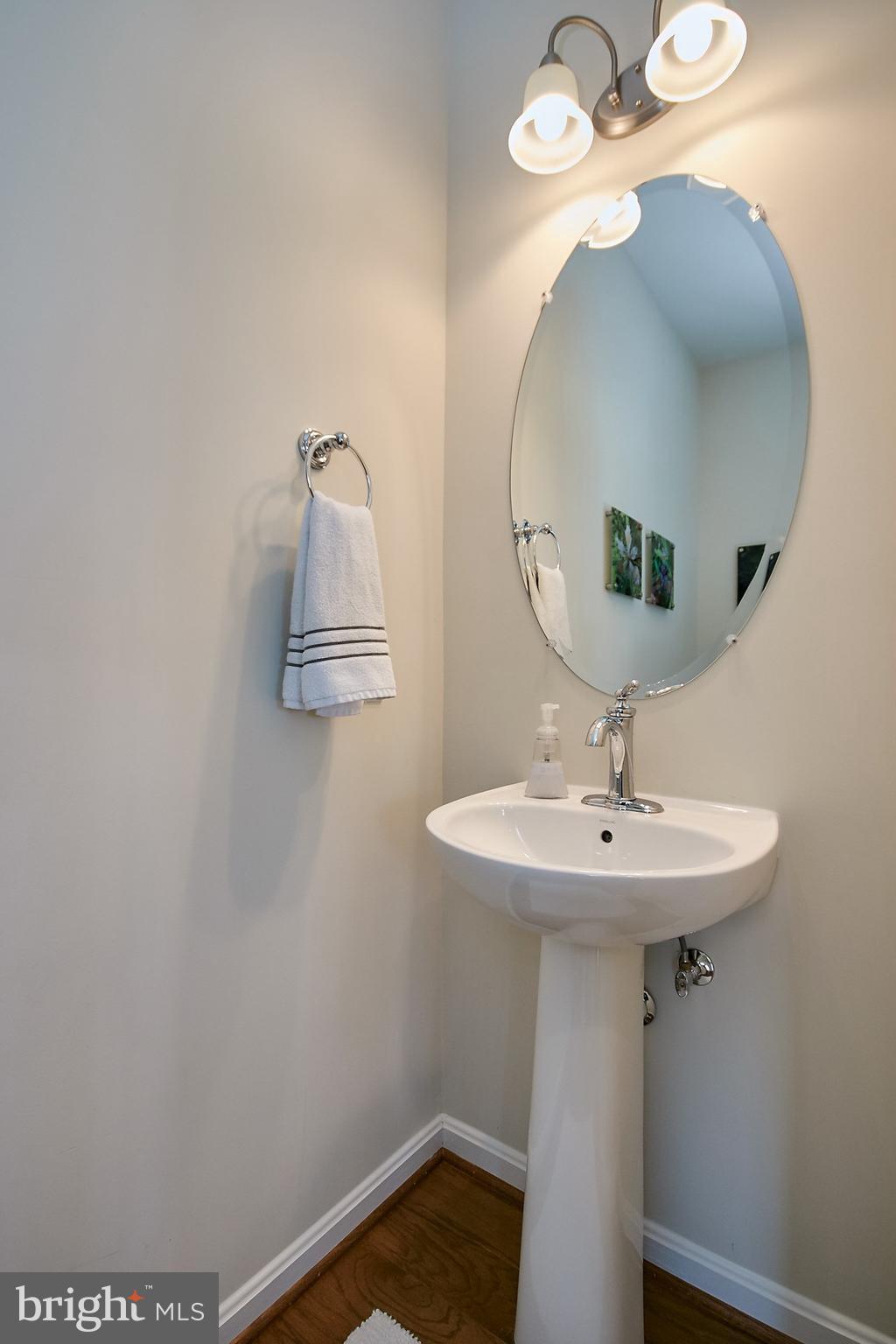 3073 Rittenhouse Circle, Unit 60 Fairfax, VA 22031 - Photo 16 of 30 a bathroom with a sink a mirror and vanity