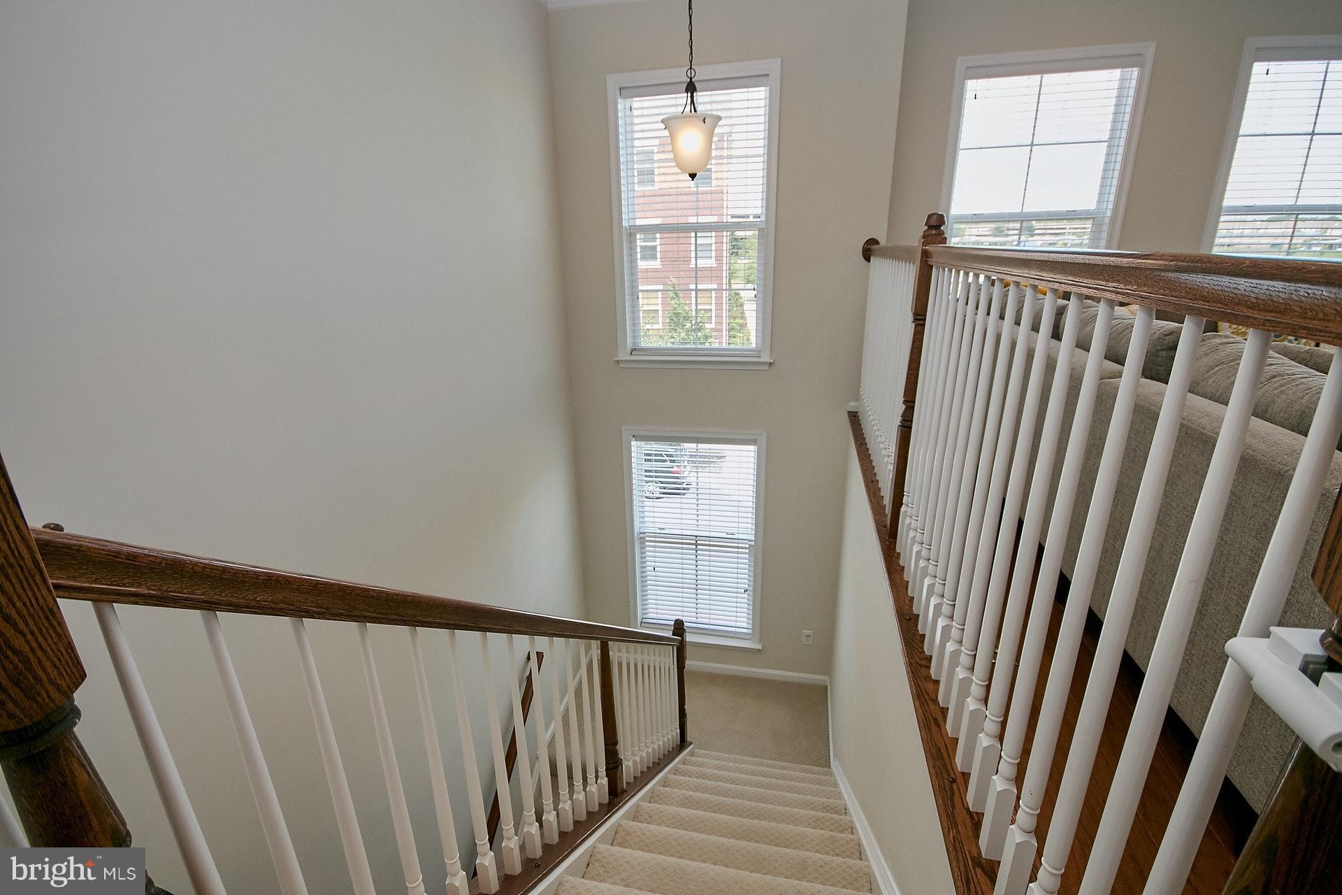 3073 Rittenhouse Circle, Unit 60 Fairfax, VA 22031 - Photo 17 of 30 a view of a hallway with windows