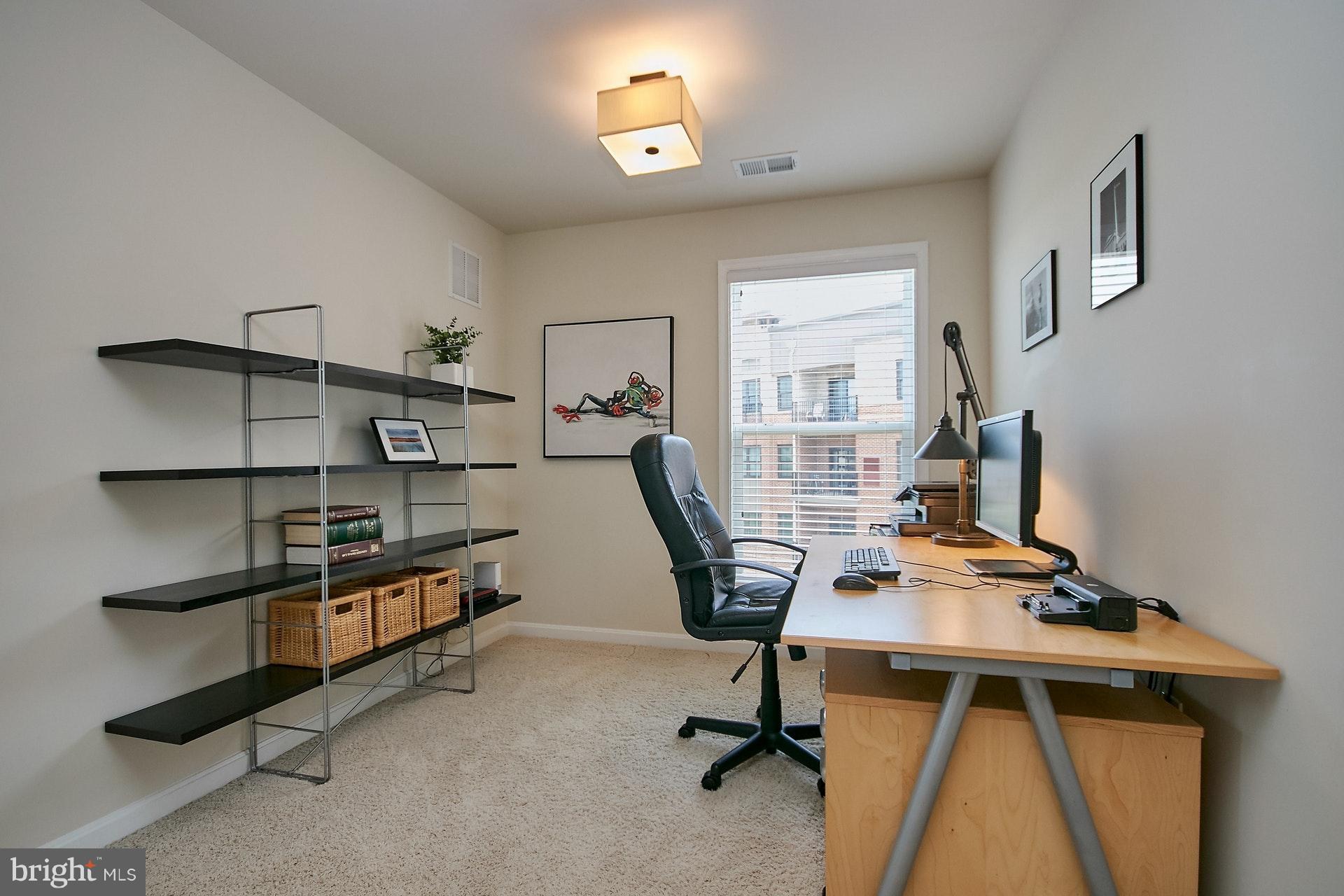 3073 Rittenhouse Circle, Unit 60 Fairfax, VA 22031 - Photo 18 of 30 a view of a workspace with furniture and a window