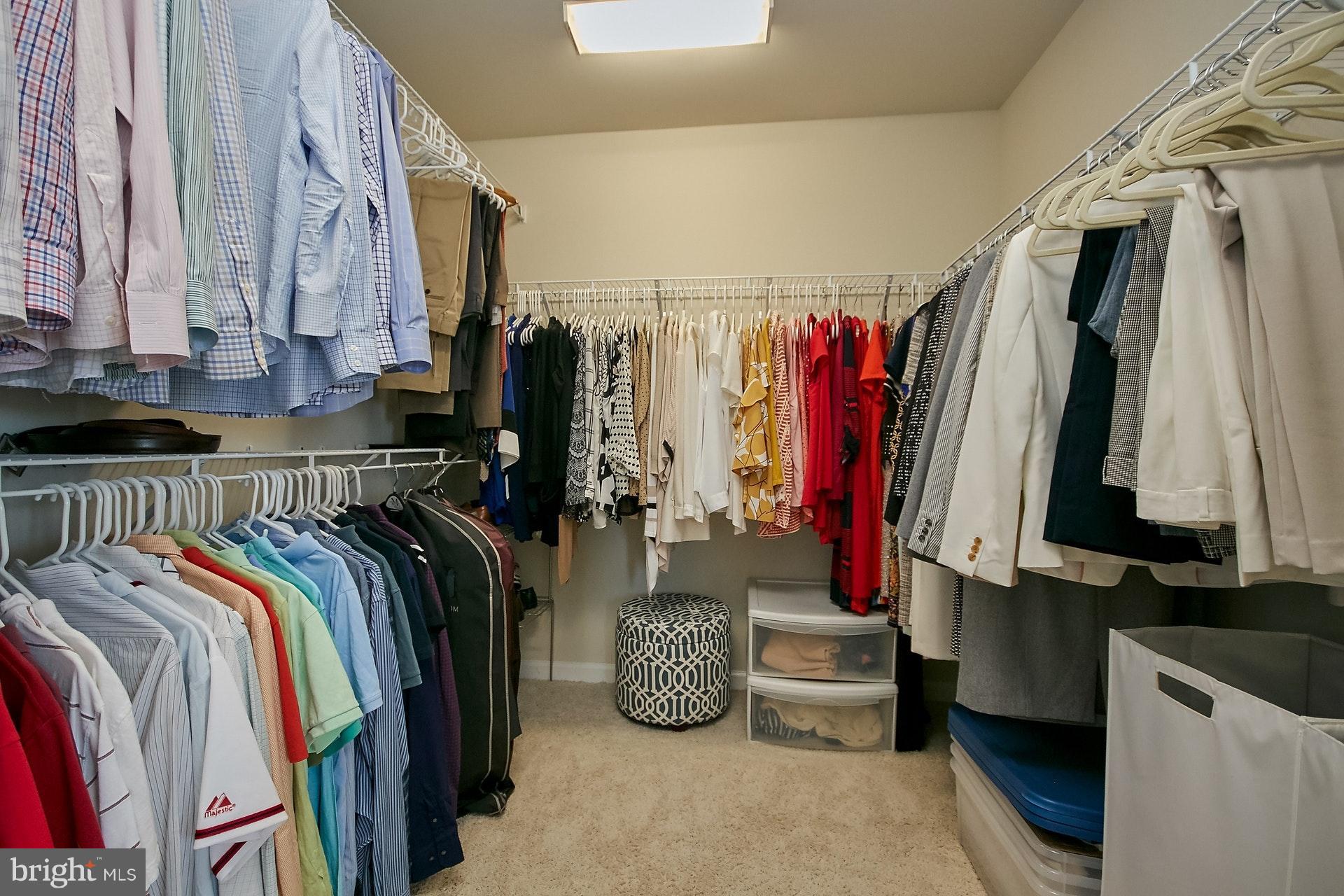 3073 Rittenhouse Circle, Unit 60 Fairfax, VA 22031 - Photo 24 of 30 a view of walk in closet with clothes and shoes