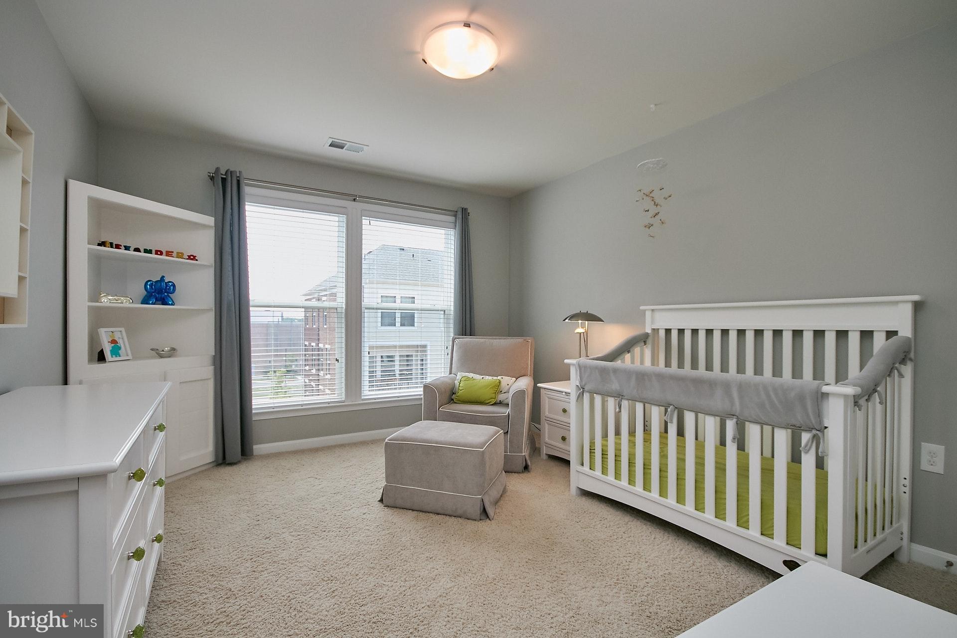 3073 Rittenhouse Circle, Unit 60 Fairfax, VA 22031 - Photo 28 of 30 a bedroom with furniture and a window