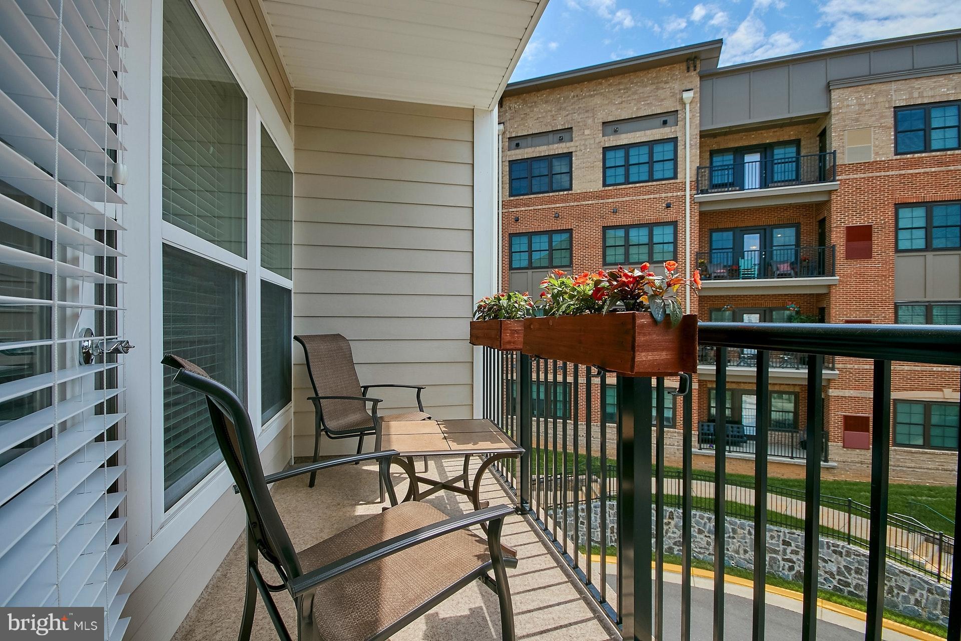 3073 Rittenhouse Circle, Unit 60 Fairfax, VA 22031 - Photo 30 of 30 a view of a brick house with an outdoor seating