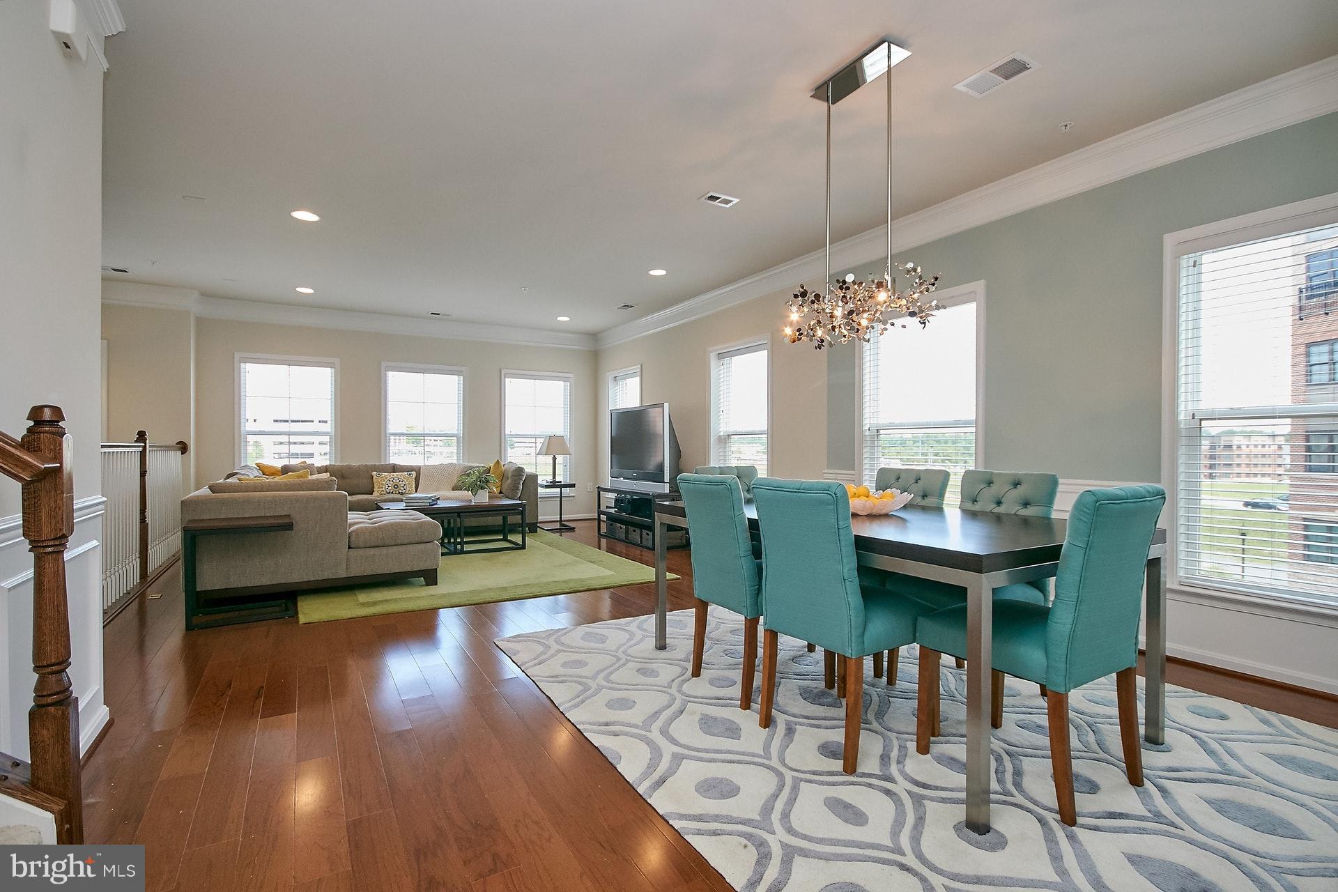 3073 Rittenhouse Circle, Unit 60 Fairfax, VA 22031 - Photo 6 of 30 a view of a dining room with furniture window and wooden floor