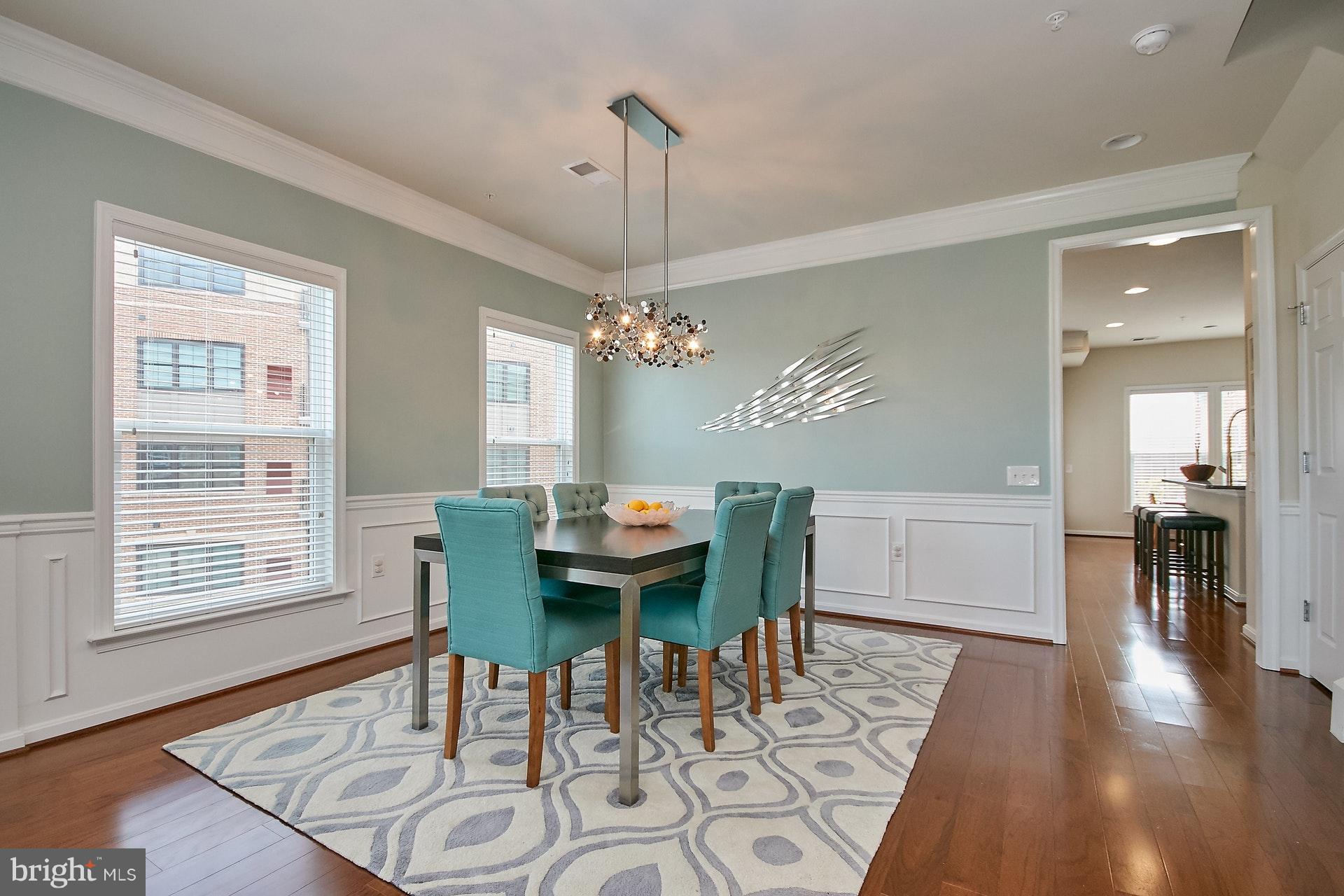 3073 Rittenhouse Circle, Unit 60 Fairfax, VA 22031 - Photo 7 of 30 a view of a dining room with furniture window and wooden floor