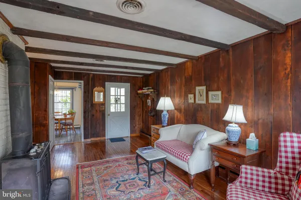 a living room with furniture and a table