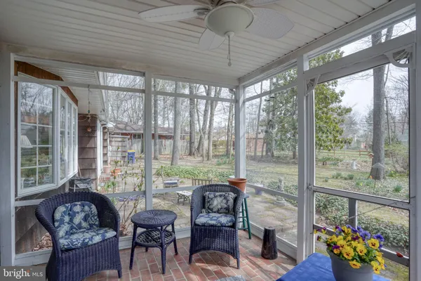 a bathroom with a sink mirror and vanity