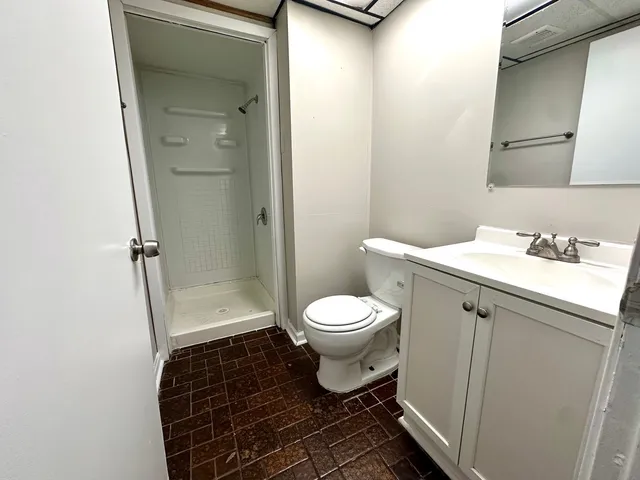 a bathroom with a toilet and a sink