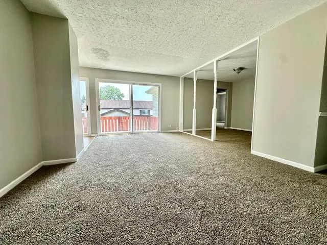 an empty room with windows