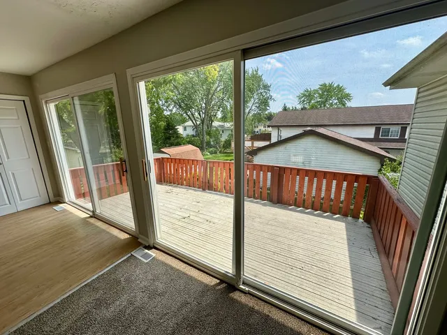 a view of a porch with wooden floor and outdoor space
