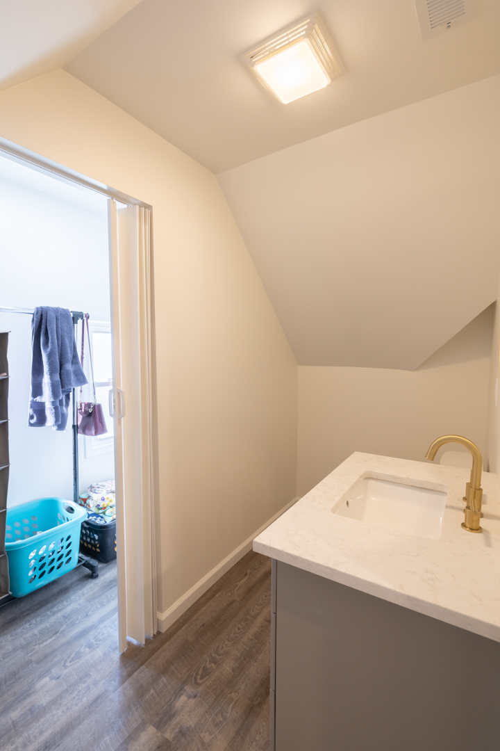 394 West Hawkins Street Kankakee, IL 60901 - Photo 14 of 26 a bathroom with a sink and a mirror