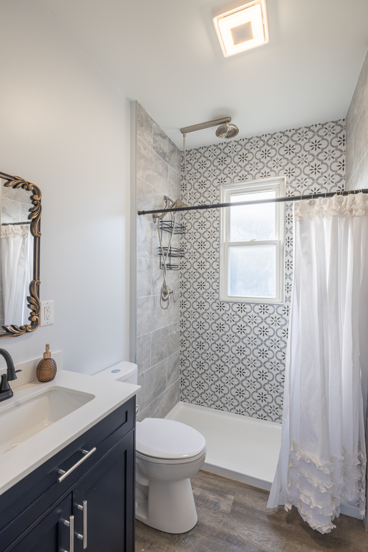 394 West Hawkins Street Kankakee, IL 60901 - Photo 15 of 26 a bathroom with a sink a toilet and shower