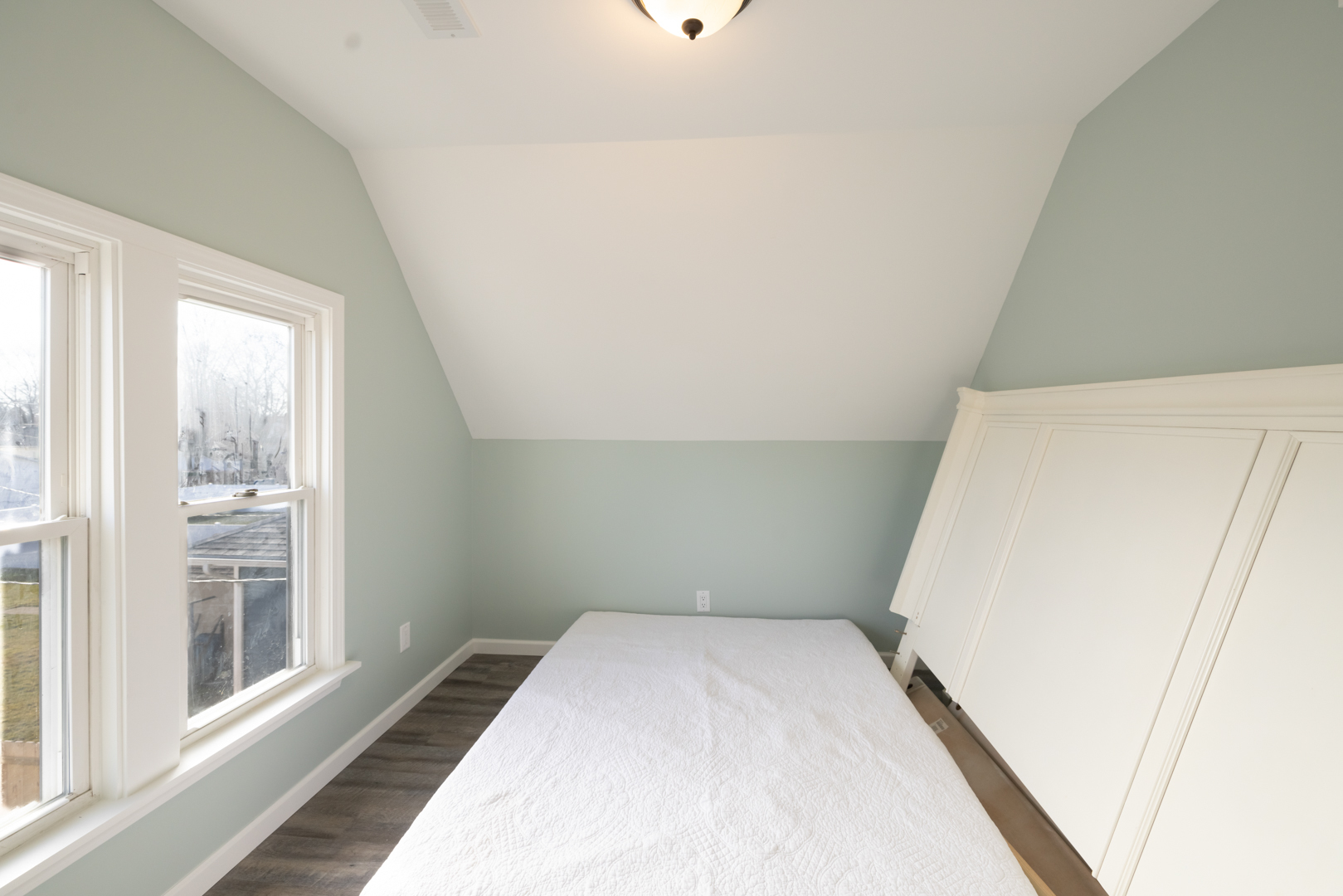394 West Hawkins Street Kankakee, IL 60901 - Photo 19 of 26 a view of room with window and wooden floor