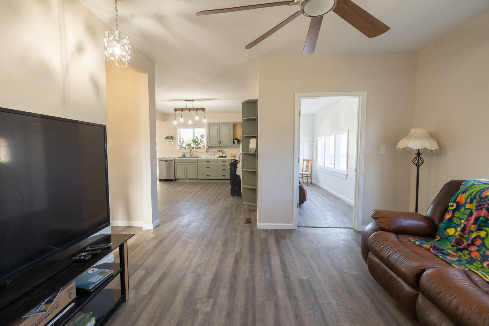 394 West Hawkins Street Kankakee, IL 60901 - Photo 3 of 26 a living room with furniture and a flat screen tv
