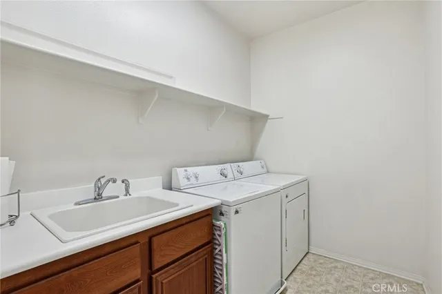 a bathroom with a sink toilet tub and shower