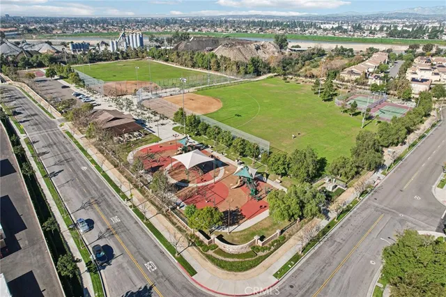 a view of a swimming pool with a table and chairs