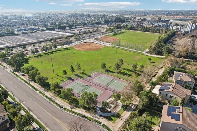 a view of a swimming pool with outdoor seating