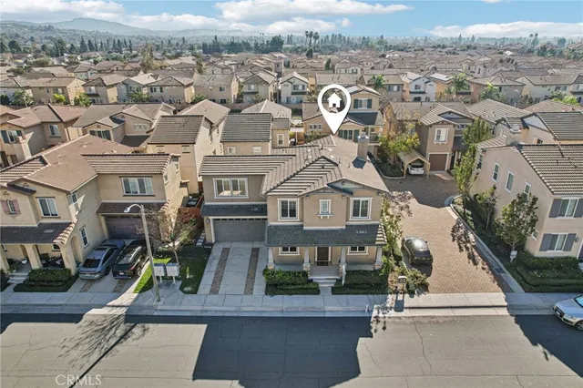 an aerial view of a city and lake view