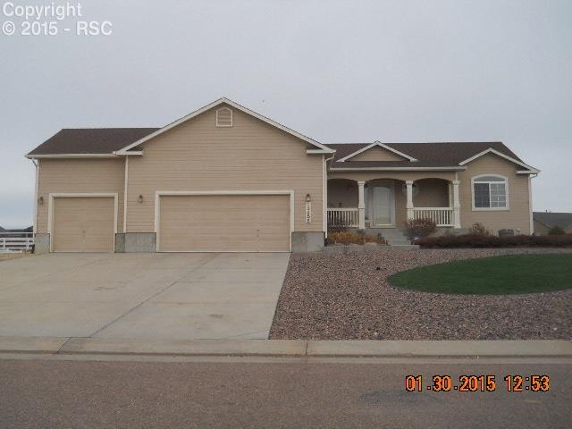 12456 Snaffle Bit Road Peyton, CO 80831 - Photo 1 of 14