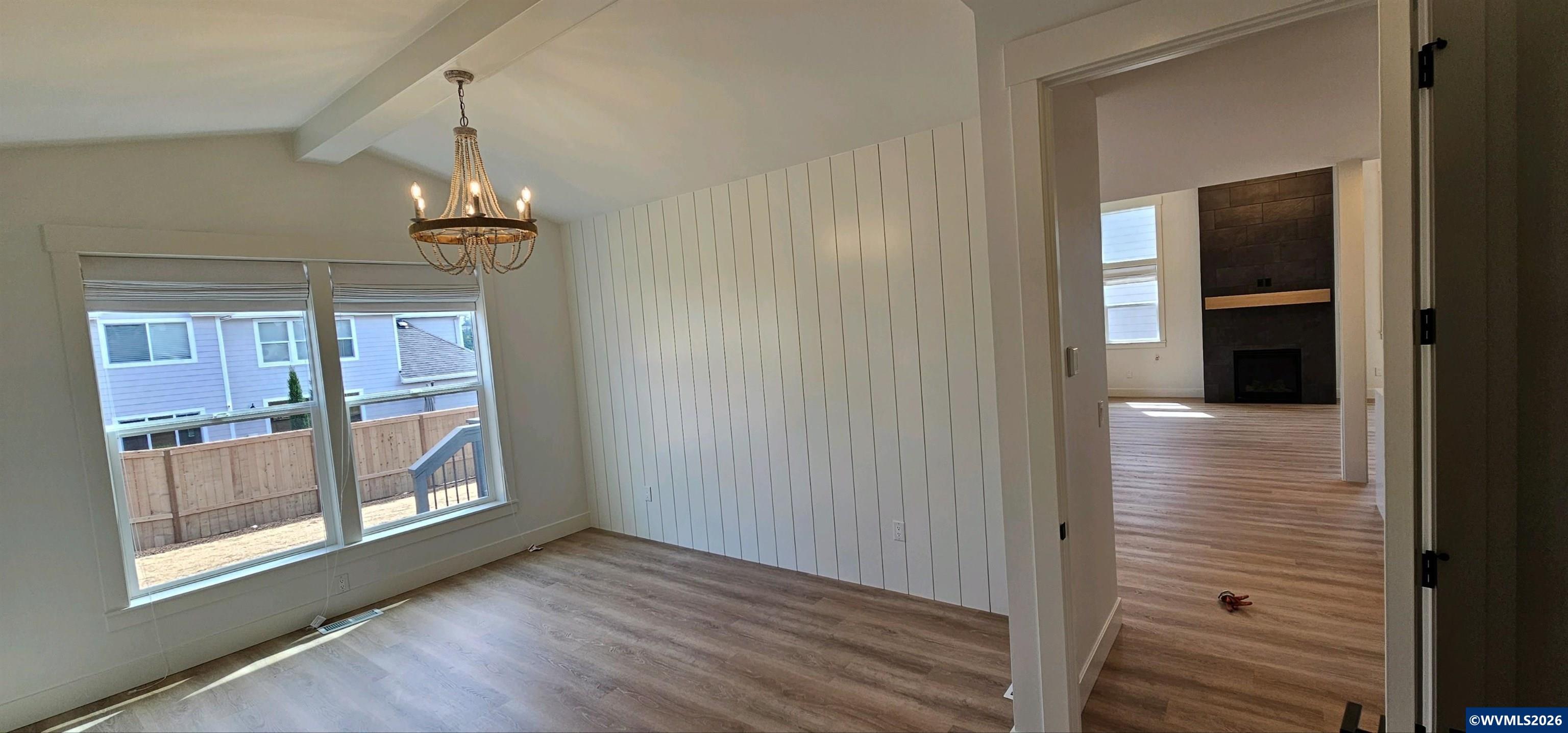Model B Salishan Street Southeast Salem, OR 97302 - Photo 6 of 30 wooden floor in an empty room with a window