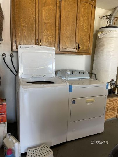 118 Chambers Street Ridgecrest, CA 93555 - Photo 5 of 16 a utility room with dryer and washer