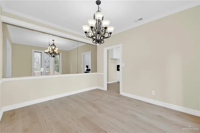 a view of a chandelier in a room