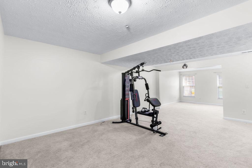 8605 Accokeek Street Laurel, MD 20724 - Photo 34 of 44 a view of a room with gym equipment