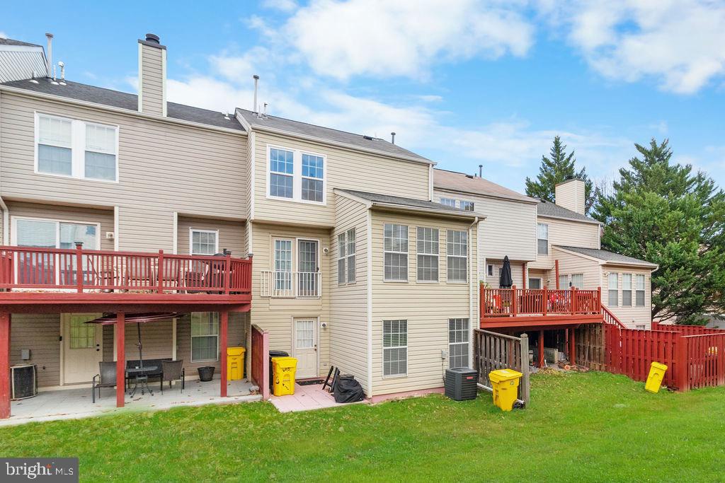 8605 Accokeek Street Laurel, MD 20724 - Photo 42 of 44 a view of a house with a yard and sitting area