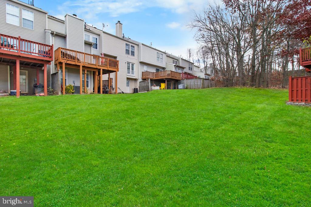 8605 Accokeek Street Laurel, MD 20724 - Photo 43 of 44 a view of a building with a yard