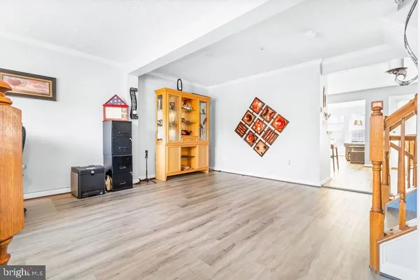 a workspace with furniture and wooden floor