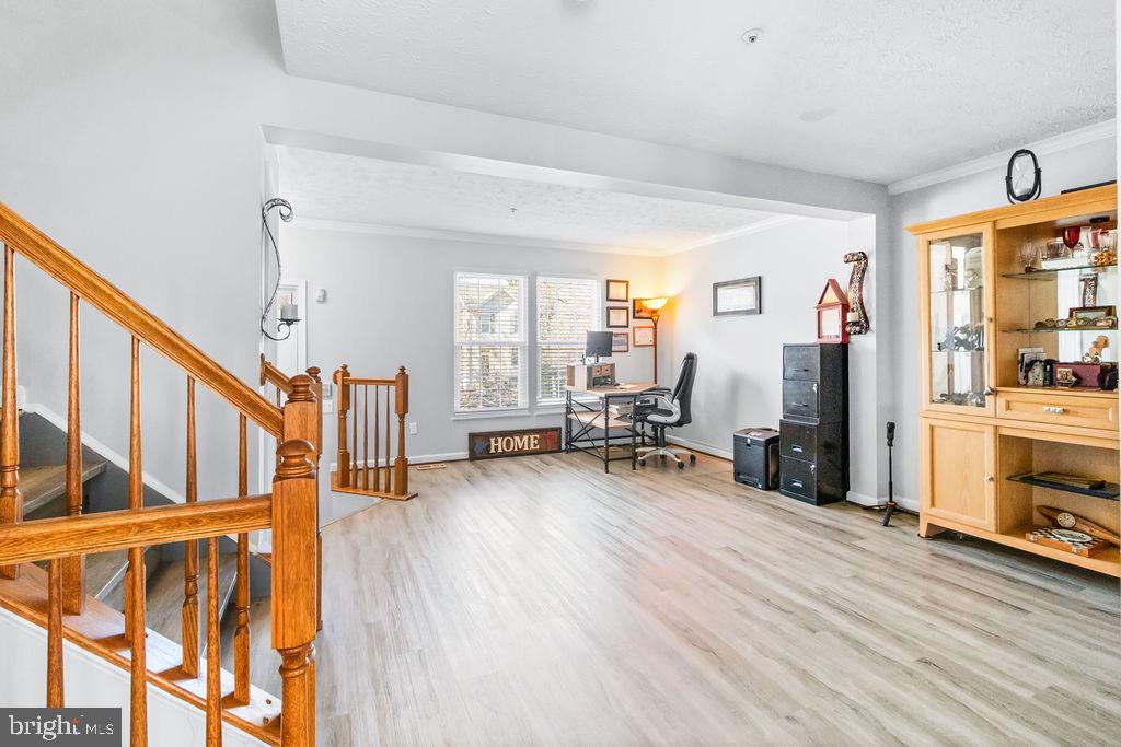8605 Accokeek Street Laurel, MD 20724 - Photo 9 of 44 a view of a livingroom with furniture and a flat screen tv
