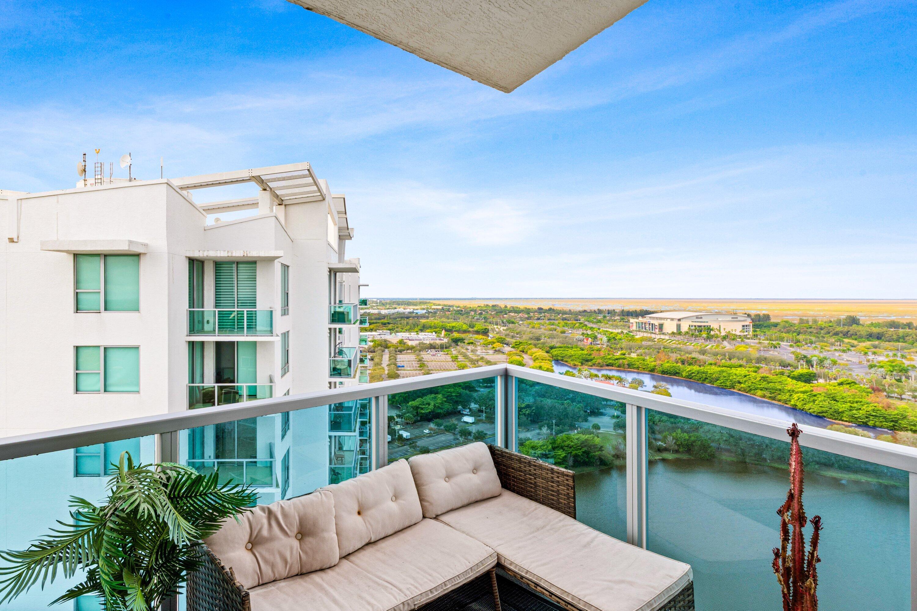 2641 North Flamingo Road, Unit 2701N Sunrise, FL 33323 - Photo 23 of 38 a balcony with an ocean view