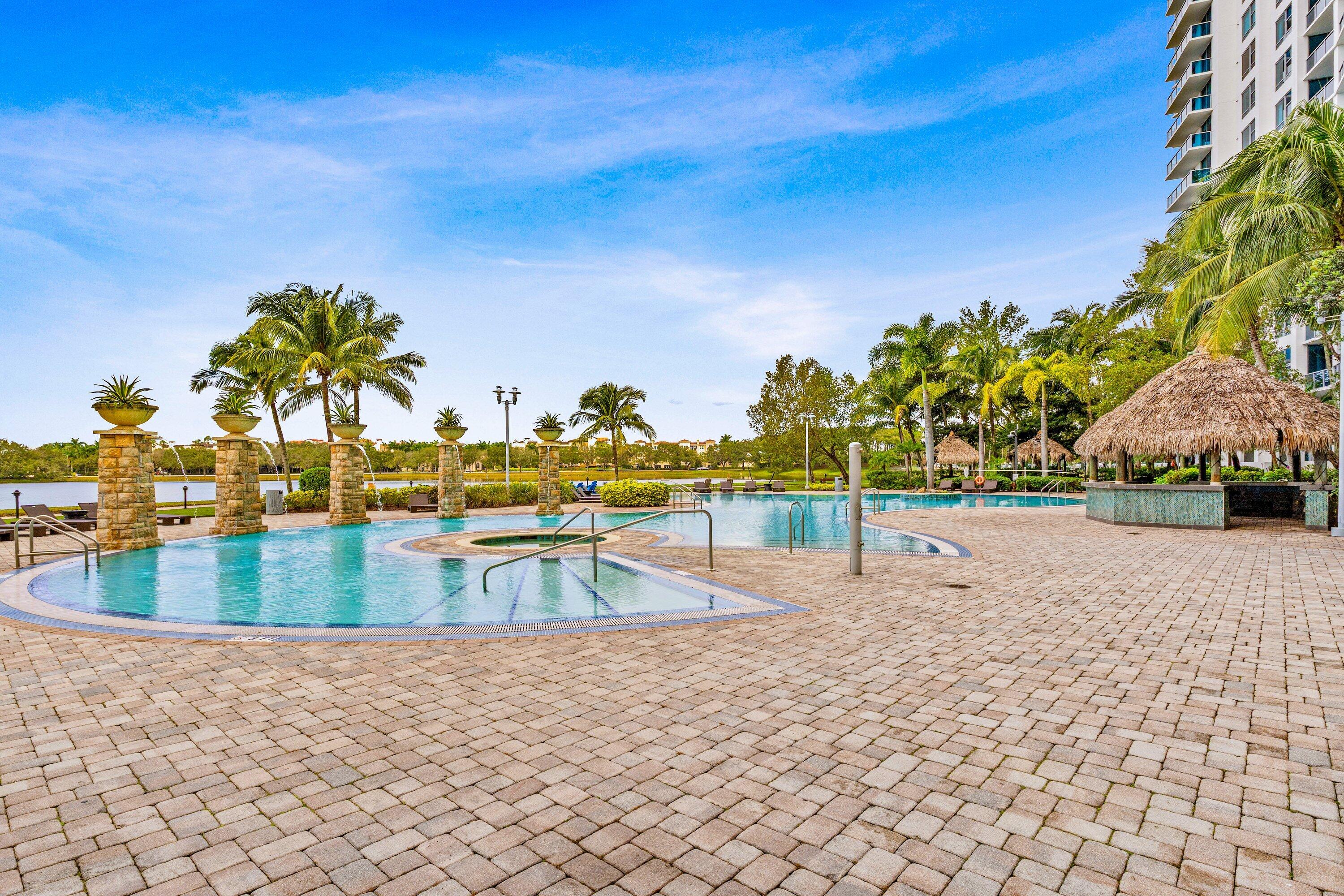 2641 North Flamingo Road, Unit 2701N Sunrise, FL 33323 - Photo 28 of 38 a view of a swimming pool with an outdoor seating