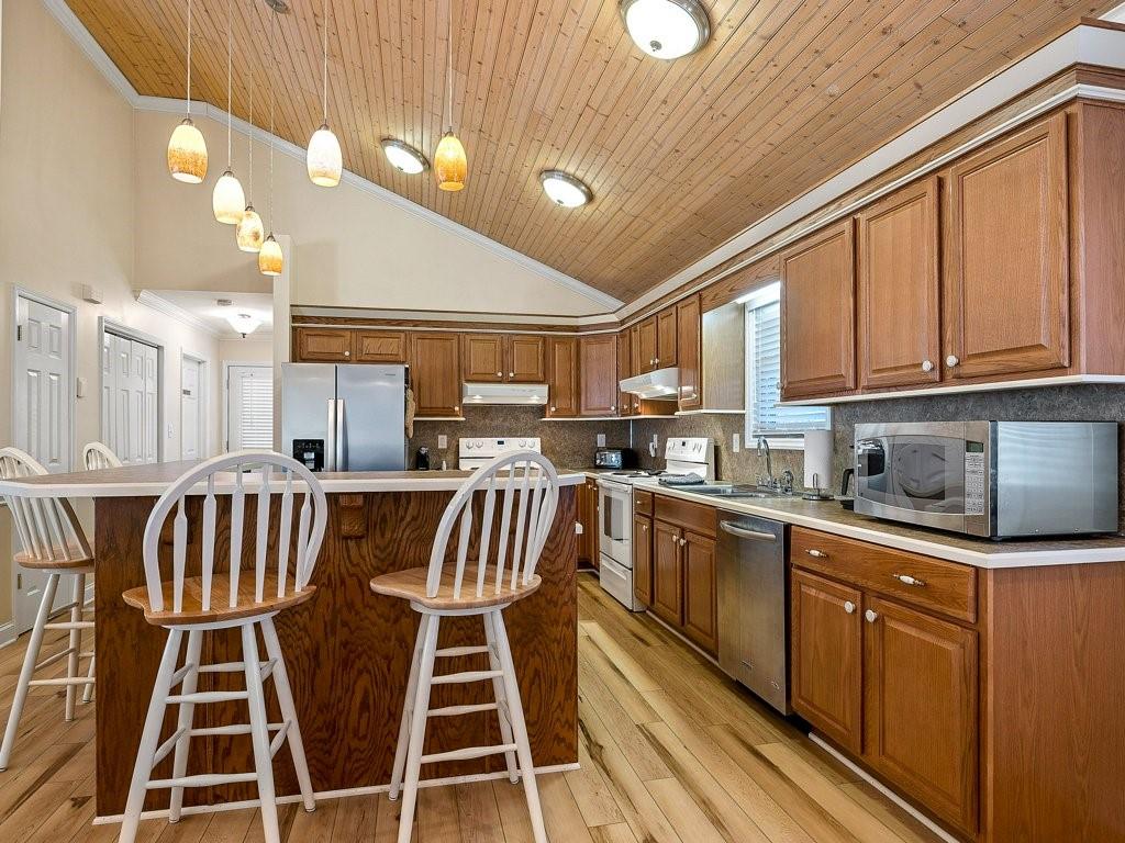 3245 Holly Road Connelly Springs, NC 28612 - Photo 11 of 39 a kitchen with sink cabinets and window