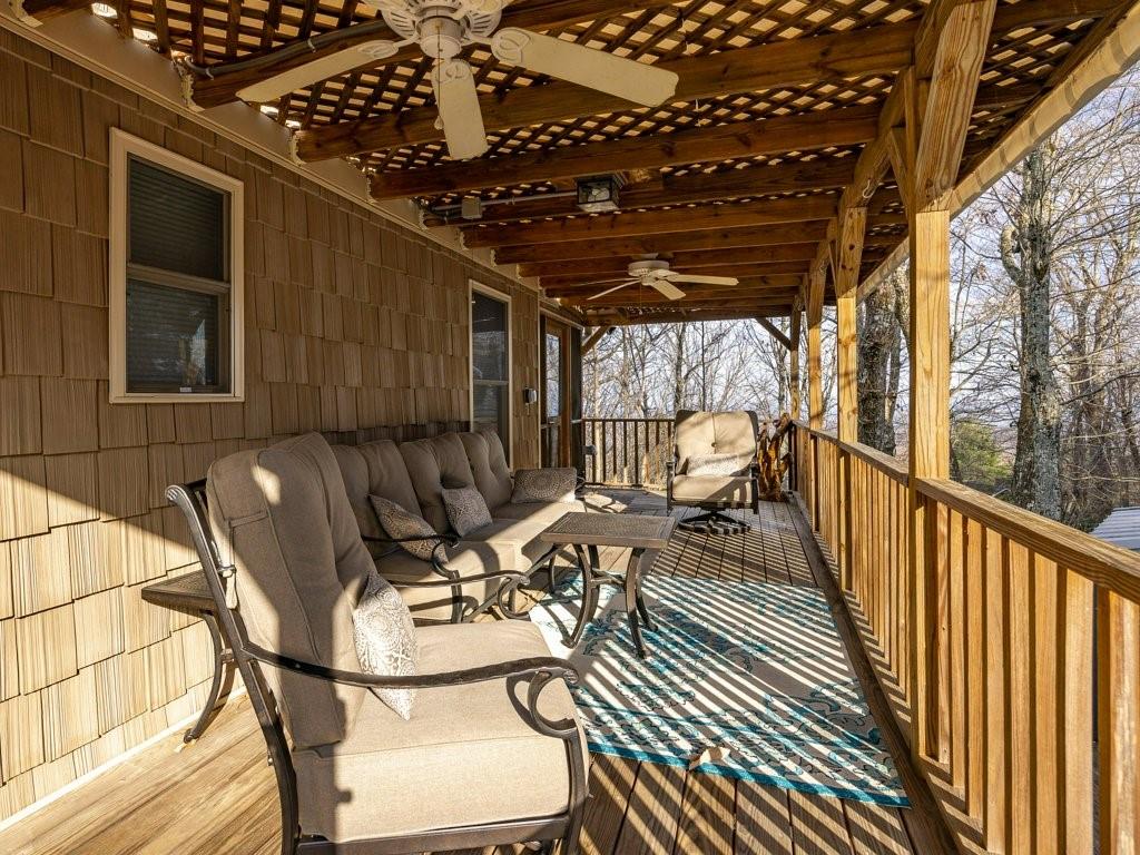 3245 Holly Road Connelly Springs, NC 28612 - Photo 21 of 39 a view of a chairs and table in the balcony