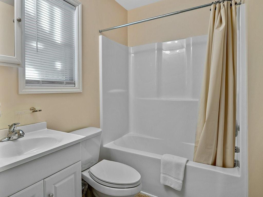 3245 Holly Road Connelly Springs, NC 28612 - Photo 27 of 39 a bathroom with a sink toilet and shower