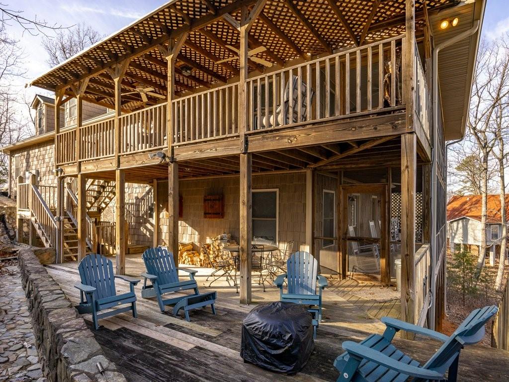 3245 Holly Road Connelly Springs, NC 28612 - Photo 28 of 39 a view of a chairs and table in the patio