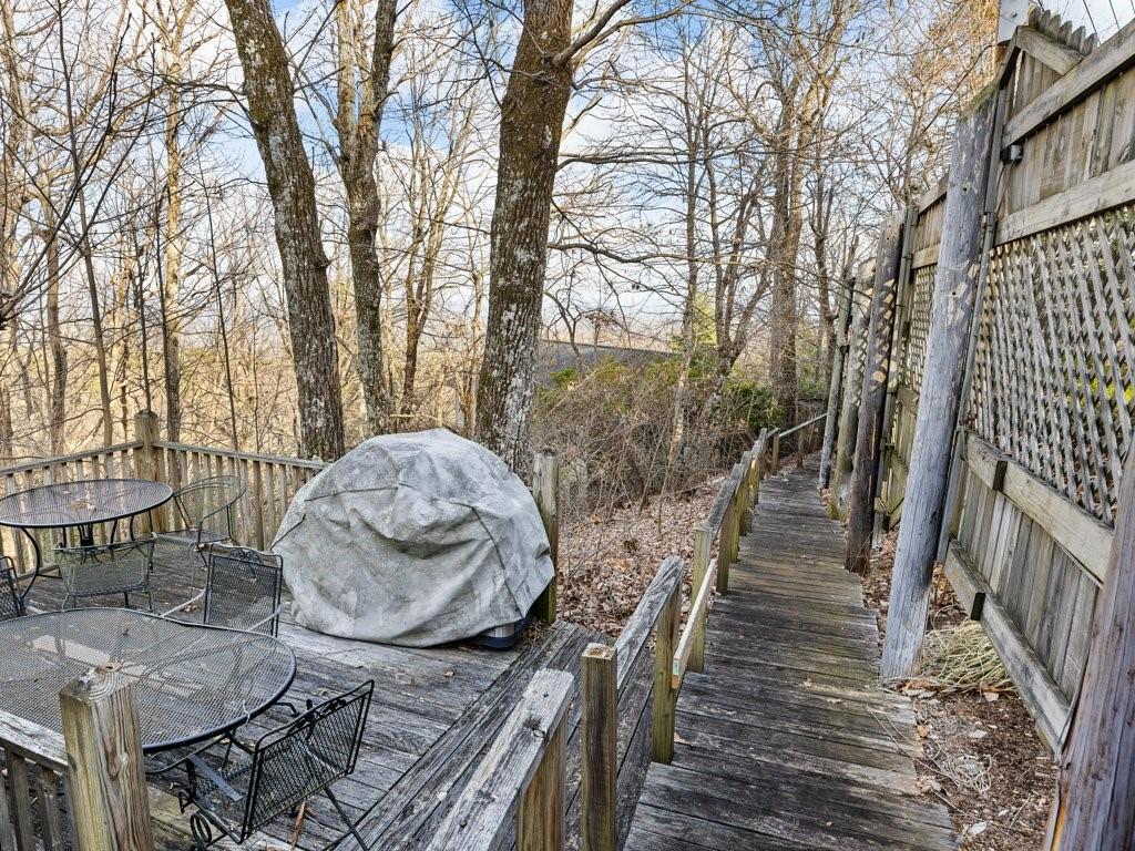 3245 Holly Road Connelly Springs, NC 28612 - Photo 32 of 39 a view of a chairs and table in the patio