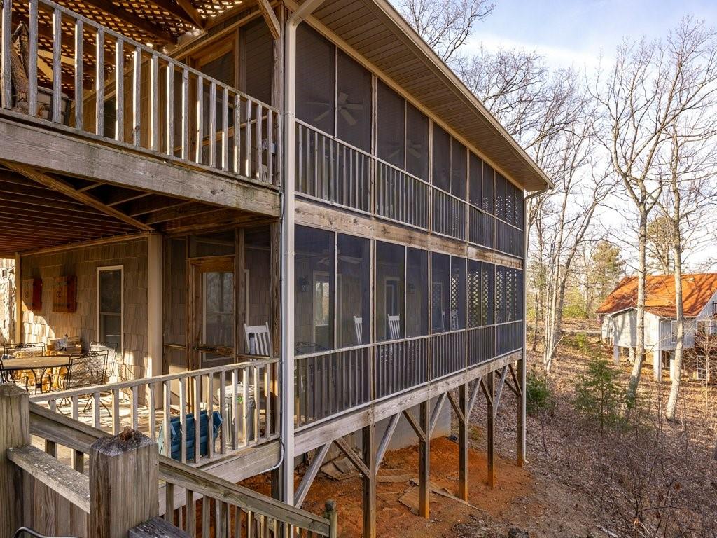 3245 Holly Road Connelly Springs, NC 28612 - Photo 33 of 39 a view of a house with backyard and deck
