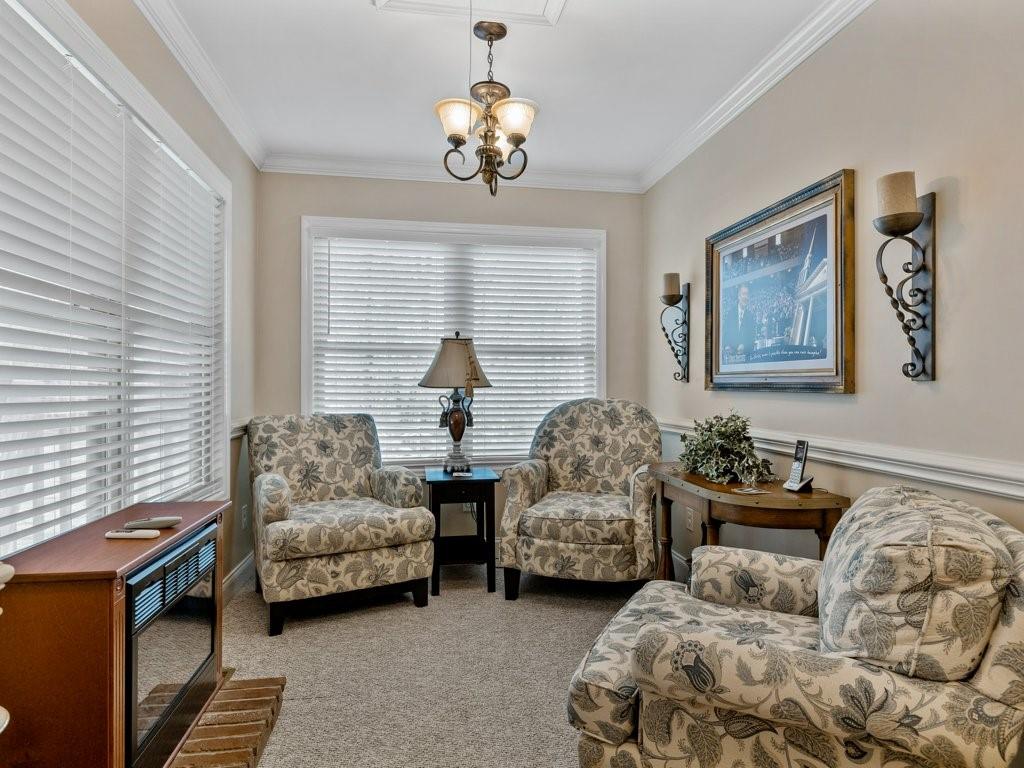 3245 Holly Road Connelly Springs, NC 28612 - Photo 4 of 39 a living room with furniture and a large window