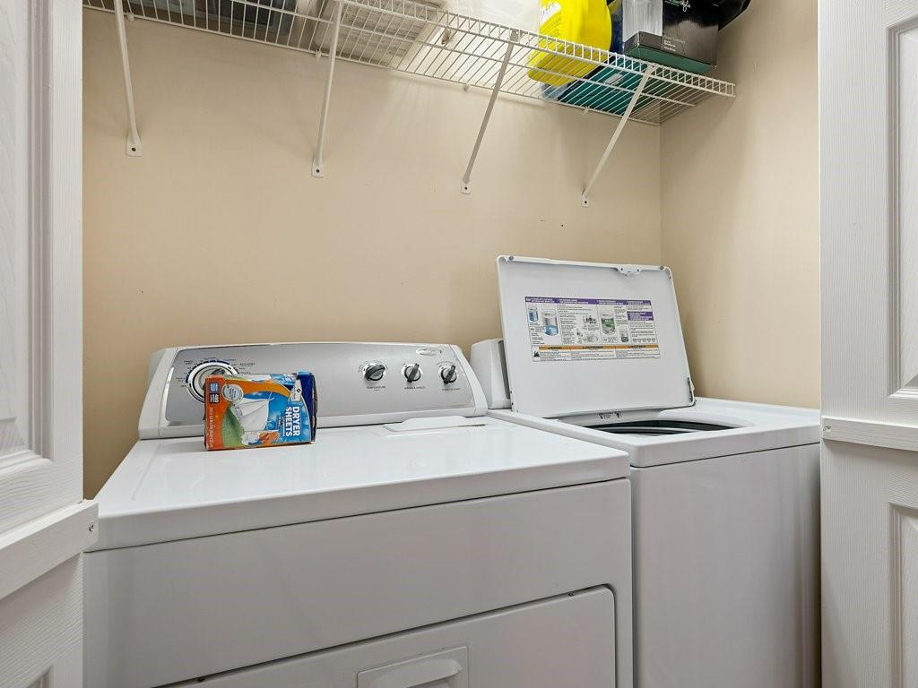 3245 Holly Road Connelly Springs, NC 28612 - Photo 8 of 39 a utility room with dryer and washer