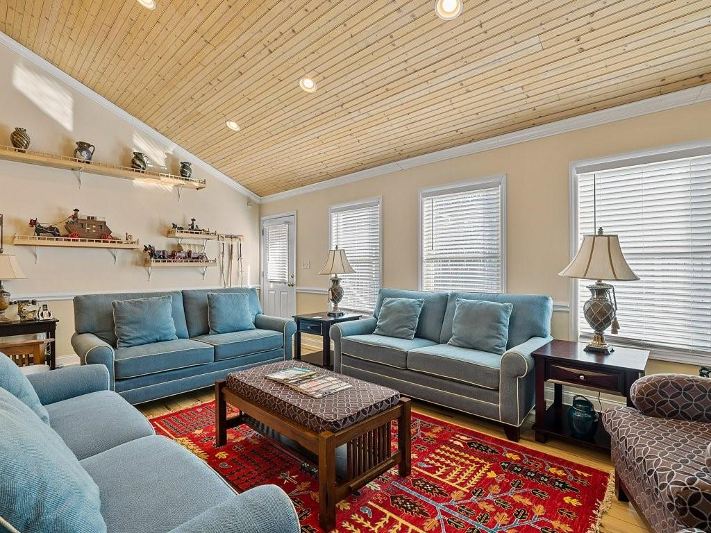 3245 Holly Road Connelly Springs, NC 28612 - Photo 9 of 39 a living room with furniture a rug and a window