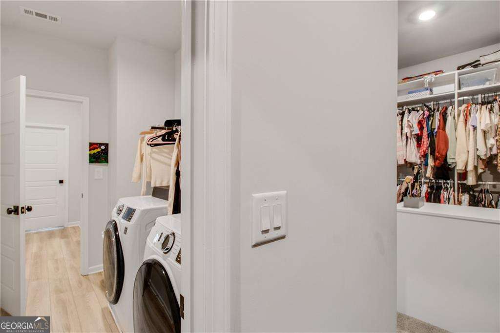 338 Ryston Way Grayson, GA 30017 - Photo 30 of 61 a view of walk in closet with clothes and shoes