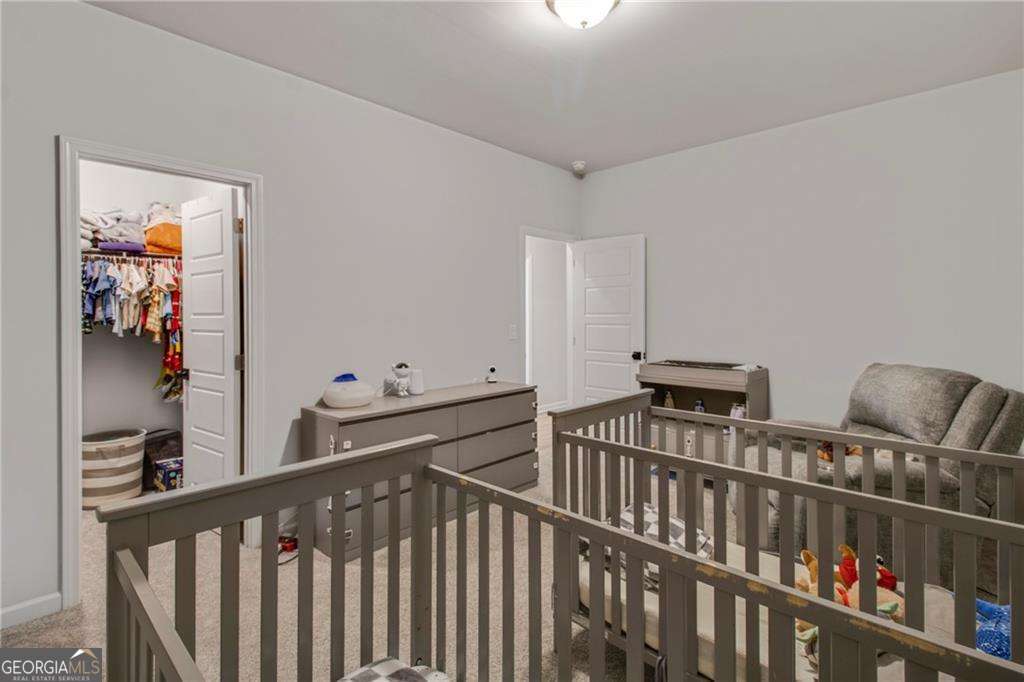 338 Ryston Way Grayson, GA 30017 - Photo 32 of 61 a view of a hallway with workspace