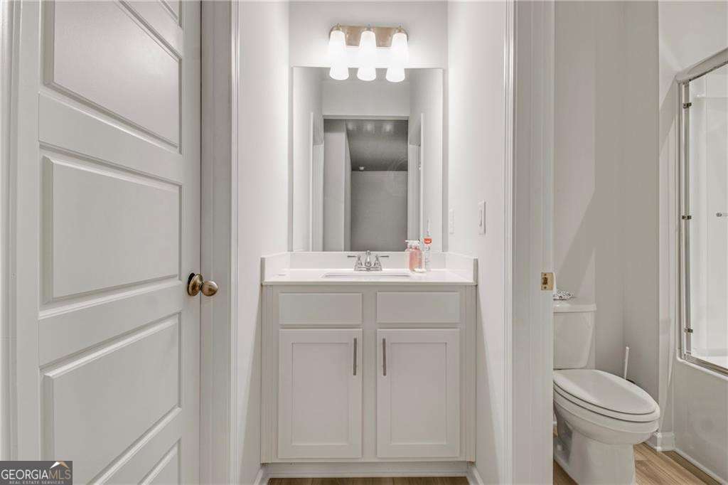 338 Ryston Way Grayson, GA 30017 - Photo 42 of 61 a bathroom with a sink vanity mirror and toilet