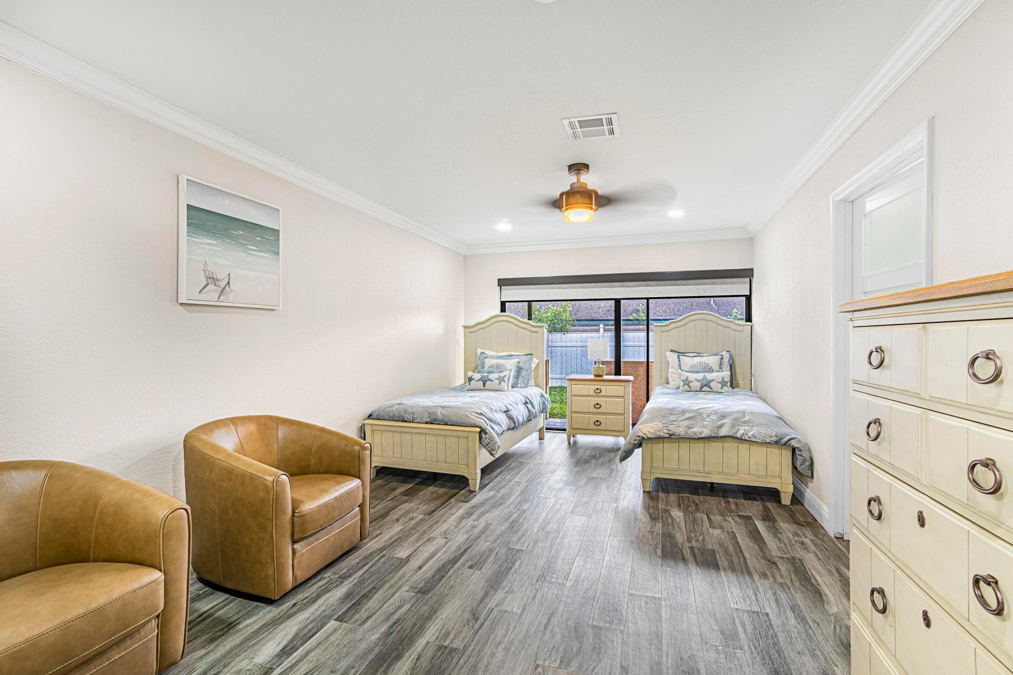 3374 Northwest 27th Terrace Boca Raton, FL 33434 - Photo 17 of 33 a bedroom with furniture and wooden floor