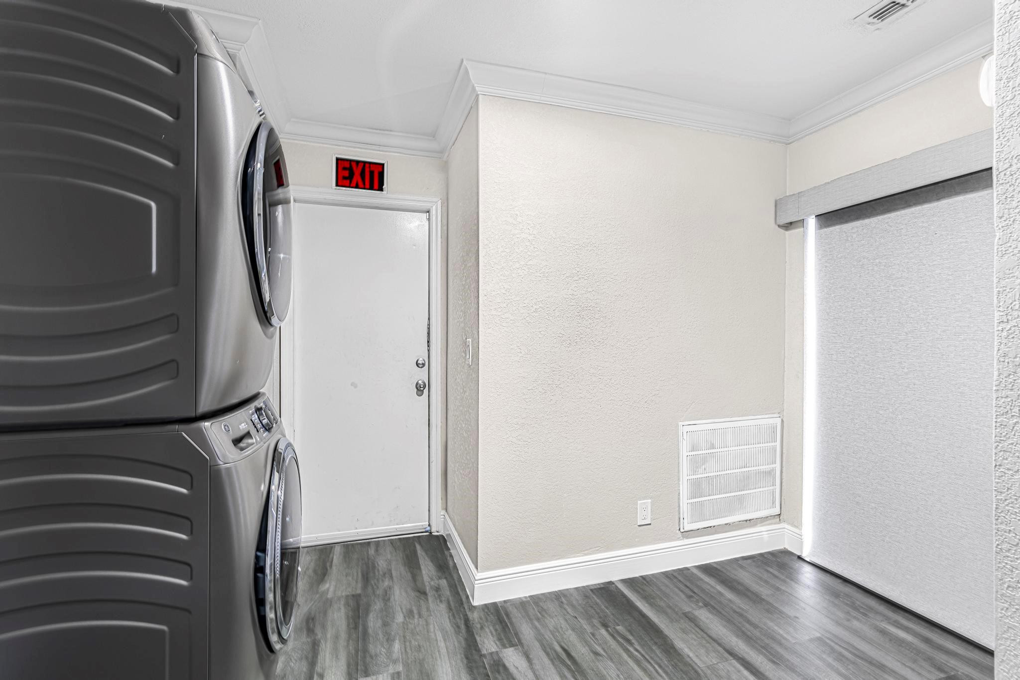 3374 Northwest 27th Terrace Boca Raton, FL 33434 - Photo 25 of 33 a view of front door with wooden floor